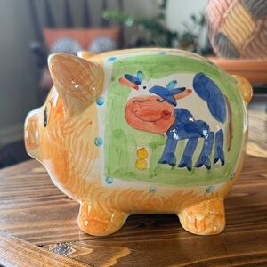 Hand Painted Colorful Orange Ceramic Piggy Bank with Blue Cow Motif